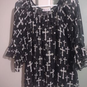 Woman's Sheer Top Reina is‎ the brand size medium